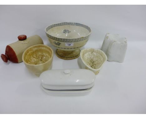 Scottish pottery sponge ware bowl, a hot water flask and Staffordshire jelly moulds etc., (a lot) 