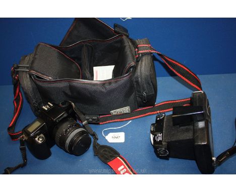 A Canon EOS Camera and case and a Polaroid camera