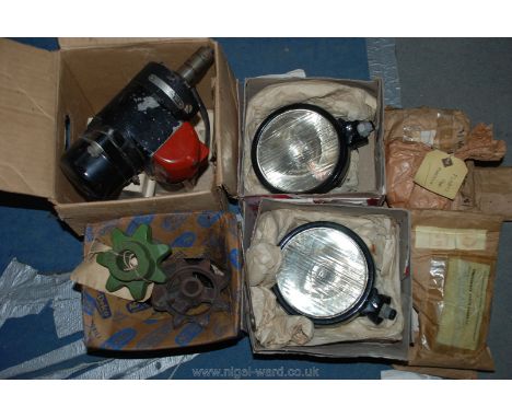 A quantity of spare parts including floats for Fordson, Bamford spares, Lucas 4VRA Magneto (one cap damaged), a pair of Lucas