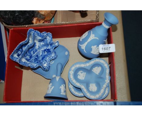 Five pieces of blue Wedgwood jasperware including bell, stemmed vase and three trinket trays together with two Copeland Spode