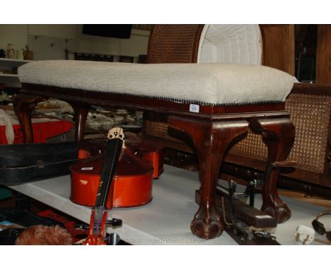 A Mahogany framed, beige fabric overstuffed, upholstered Bay Window Seat/Bench standing on substantial cabriole legs terminat