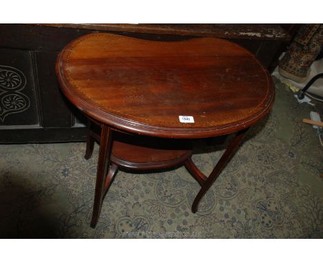 An Edwardian Mahogany Occasional Table having kidney shaped top and lower platform with light and darkwood stringing. 27" wid