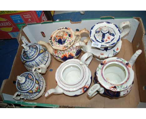 A quantity of Gaudy Welsh china including teapots, one with matching sucrier, (some lids missing)