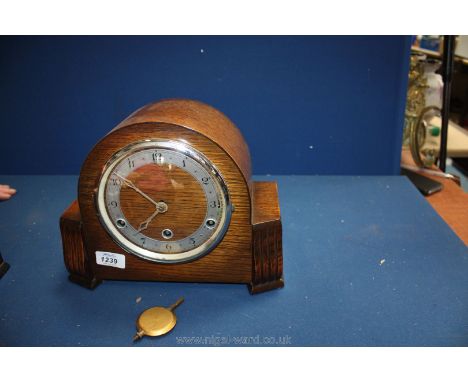 A Westminster chiming Mantle Clock