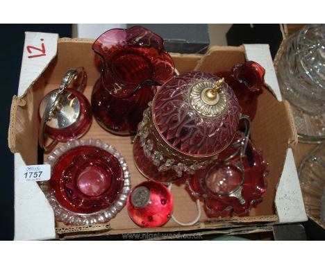 A quantity of Cranberry glass including Dartington crystal vase, Caithness paperweight with half crown insert, Webb Continent