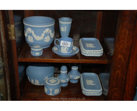 A quantity of Wedgwood light blue jasperware including salt and pepper pots, trays, jardiniere, trinket pots, etc