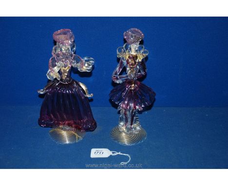 A pair of Venetian style glass figures of a lady and a gentleman in dress costume with pink and gold hi lights, repairs to bo