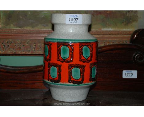 A vintage German ceramic Pot with orange, green and black glazed geometric design surrounding a speckled cream ground, 8" hig