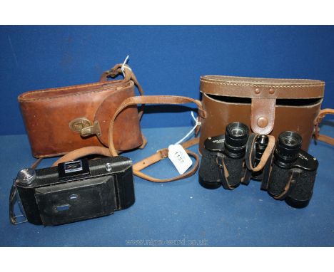 A Kodak Camera in leather case and a set of Dolland Binoculars in case