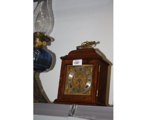 A reproduction two train movement Bracket Clock, retailed by Oswin & Co., Hereford