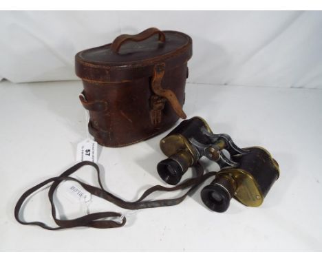 A WW1 (World War One) pair of W. Watson & Sons Ltd, Prismatic No 3 MKII x 6 binoculars, Model No 23769, marked London and Hig