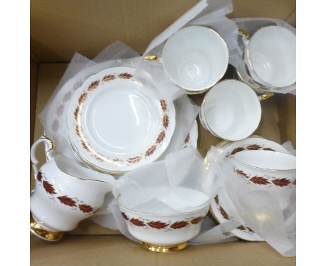 A Paragon Elegance tea service comprising six cups, saucers, side plates and one bread and butter plate, sugar and milk **PLE