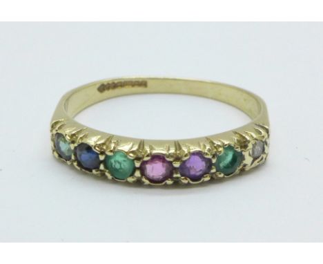 A 9ct gold seven stone ring set with diamond, emerald, sapphire, blue zircon, etc. 1.9g, P 