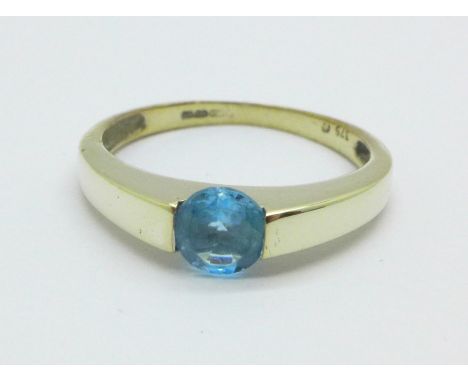 A 9ct yellow gold and topaz solitaire ring 2.2g, M 