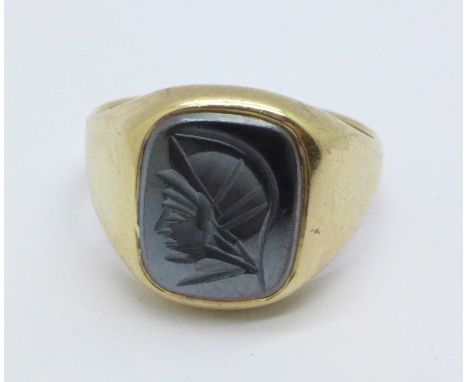 A 9ct gold and hematite intaglio ring, 4.8g, S 