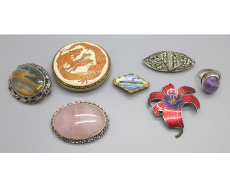 A marcasite set clip brooch, a hallmarked silver moss agate brooch, three other brooches, a Satsuma buckle and a silver and a