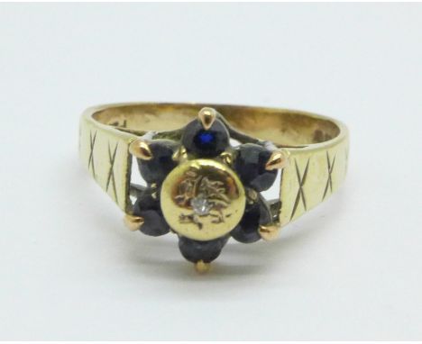 A 9ct gold, sapphire and diamond ring, 2.7g, N 