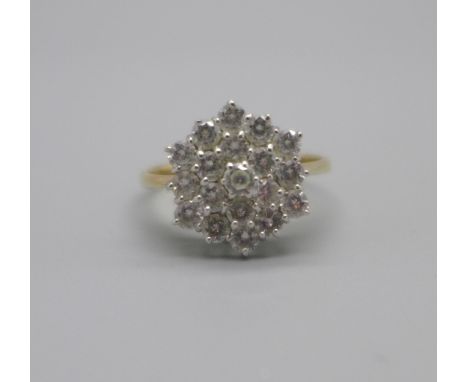 A 9ct gold and cubic zirconia cluster ring, 2.6g, P 