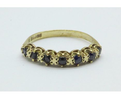 A 9ct gold, seven stone sapphire ring, 1.8g, O 