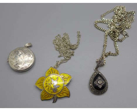 A silver and enamel pendant, a silver and marcasite pendant, both on silver chains and a sterling silver locket, 37g 