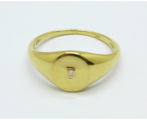 A silver gilt and diamond set signet ring, 2.5g, W 
