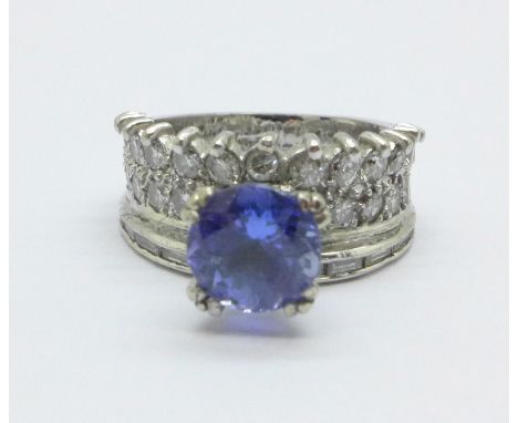 A 18ct white gold, tanzanite and 38 diamond cocktail ring, 5.2g, I 