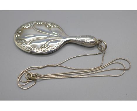 A 925 silver pendant in the form of a hand mirror on a silver chain 