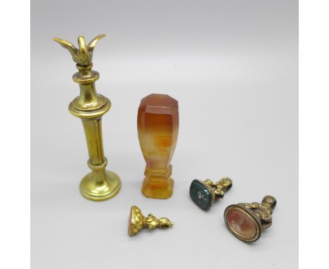 An agate seal, a brass seal with swan finial and three seal fobs 