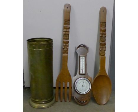 A brass stick stand, a carved oak barometer and a Welsh fork and spoon  **PLEASE NOTE THIS LOT IS NOT ELIGIBLE FOR POSTING AN