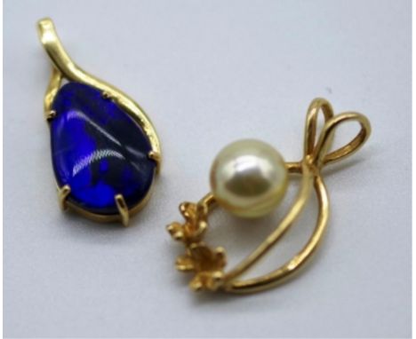 Two 14ct yellow gold pendants one set with a pearl, the other with opal