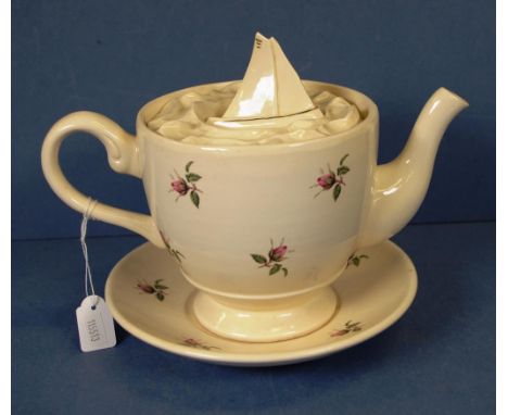 Vintage Manor Farm Pottery teapot 'Storm in a Teacup' design, with floral decoration, and yacht figure to lid, (rim chip to l