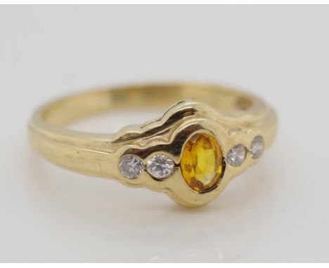 9ct yellow gold, citrine and diamond ring size 5 / K. Total weight 2.4gms