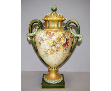 Large Royal Worcester twin handle lidded vase in green and cream tones with ornate gilt and floral decoration, circa 1897, he