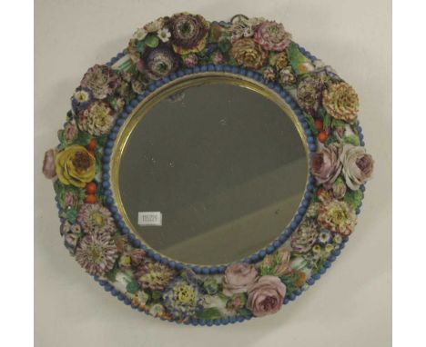 Floral encrusted ceramic wall mirror 28cm diameter