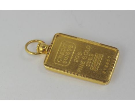 Gold pendant marked 20g 999.9 gold with gold surround, total weight: approx 24.2 grams