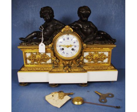 Antique French ormolu & marble mantle clock enamel dial with Roman numerals, marked for Charpentier & Co, Paris, surmounted b