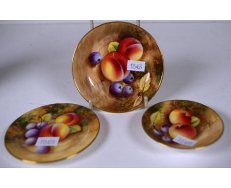 Three Royal Worcester fruit decorated pin dishes each signed to base. Diameters 7cm, 8.5cm and 9.5cm approx.