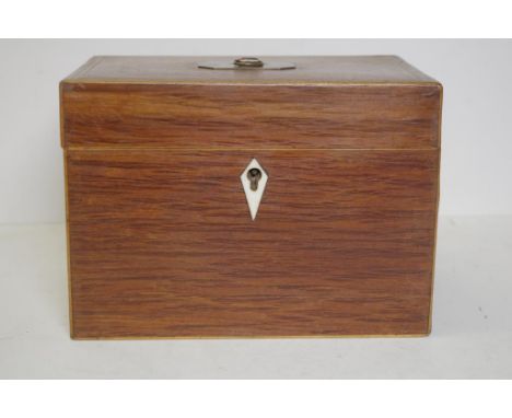 Late Georgian casuarina tea caddy with twin lidded casuarina and cedar canisters, circa 1810, 19.3cm wide, 13.5cm deep, 14cm 
