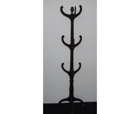 George III barristers wig stand of ebonised mahogany, central column and downswept tripod legs and spade feet. c1790