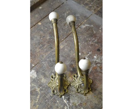 Pair of brass and ceramic coat hooks - fabulous examples. 20cm in length