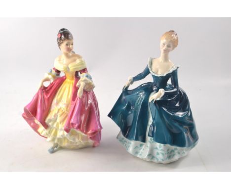 Two Royal Doulton figures to include 'Southern Bell' HN2229 1957 approx 20cm tall and 'Janine' HN2461 1970 approx 20cm tallCo