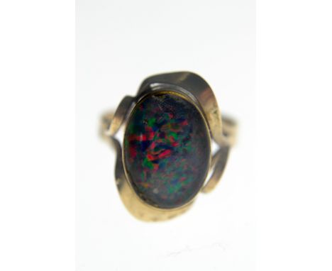 9ct gold ladies dress ring set with large opal stamped 9ct