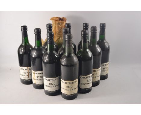 COCKBURNS 1970 vintage port, 12 bottles, 10 bottles appear in good condition, 2 bottles have leaked at some stage from cork l