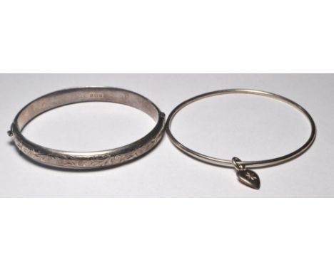 Walker and Hall 1950's silver bangle and another silver hinged bangle with heart charm. Both hallmarked. Gross 21g