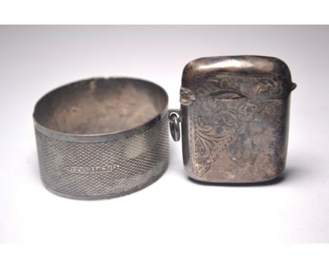 Two pieces of Birmingham silver to include small vesta case complete with matches and a napkin ring