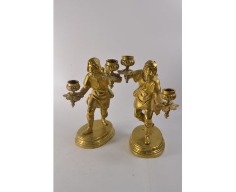 Pair of brass knight figure candlestick holders
