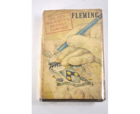 Ian Fleming's 'On Her Majesty's Secret Service'  First Edition.  Dust cover showing wear to top and lower edges but generally