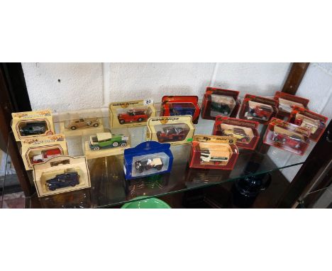 Collection of boxed model cars to include matchbox (whole shelf)