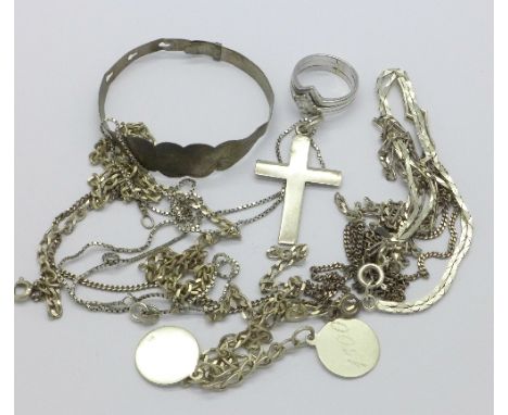 Silver jewellery including a baby's bangle, a cross and chain, a ring, a bracelet and chains, 43.6g