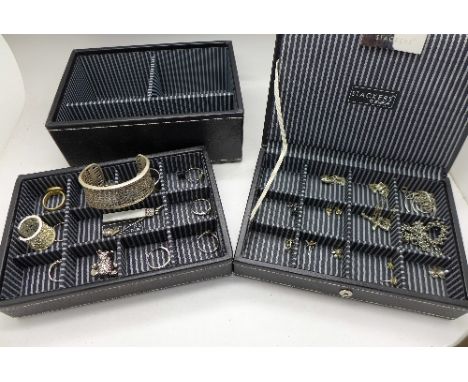 A 'Stackers' jewellery box with silver jewellery including a bangle, rings, earrings, etc.